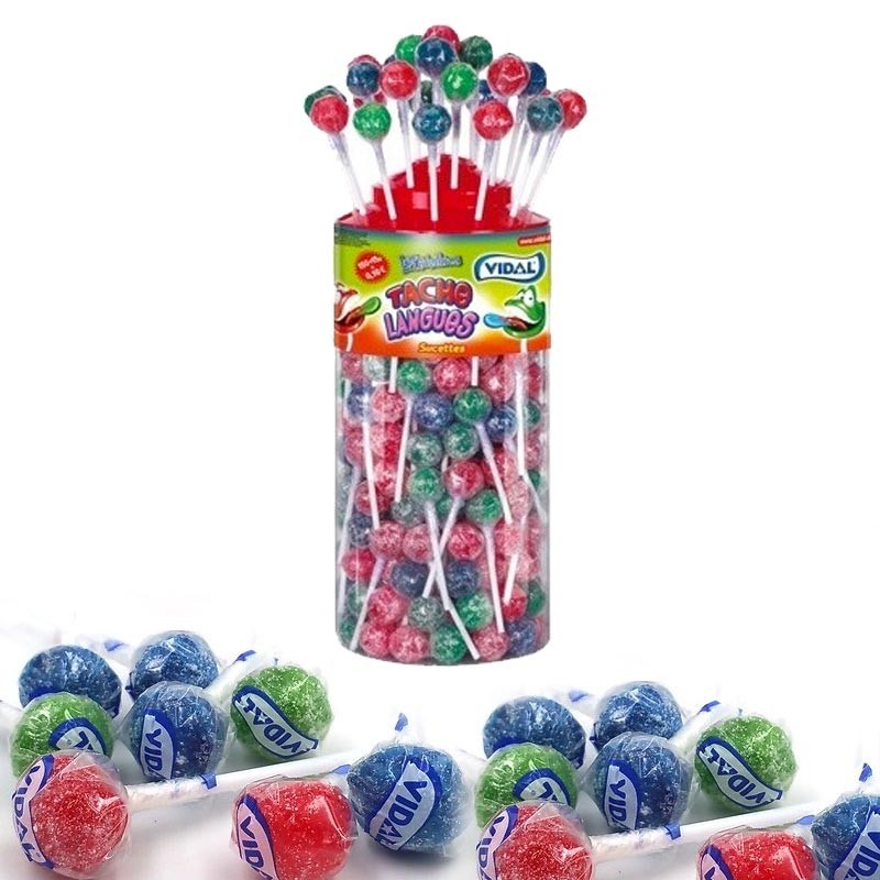 Bonbon à lécher aux multiples couleurs avec au centre un chewing-gum